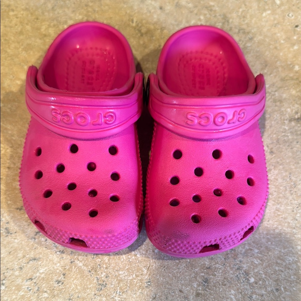 Toddler girl size 7 bright pink crocs